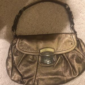 Gold Prada shoulder bag